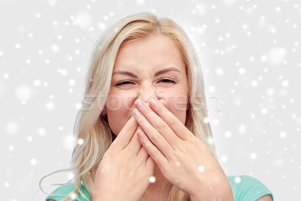 Młoda kobieta nosa emocje Zdjęcia stock © dolgachov