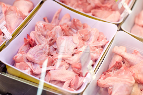 Baromfi hús tálak élelmiszer vásár étel Stock fotó © dolgachov