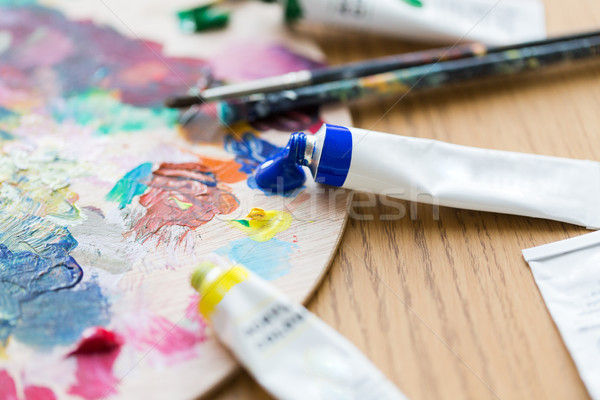 acrylic color or paint tubes and palette Stock photo © dolgachov