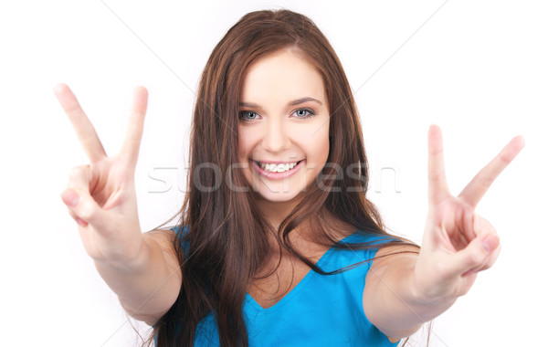 Overwinning heldere foto meisje tonen teken Stockfoto © dolgachov