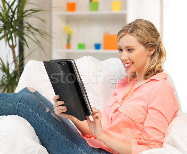 woman with tablet pc computer or touchpad indoors Stock photo © dolgachov