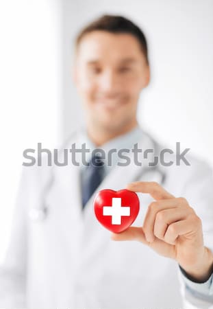 Stock photo: smiling female doctor or nurse with tablet pc