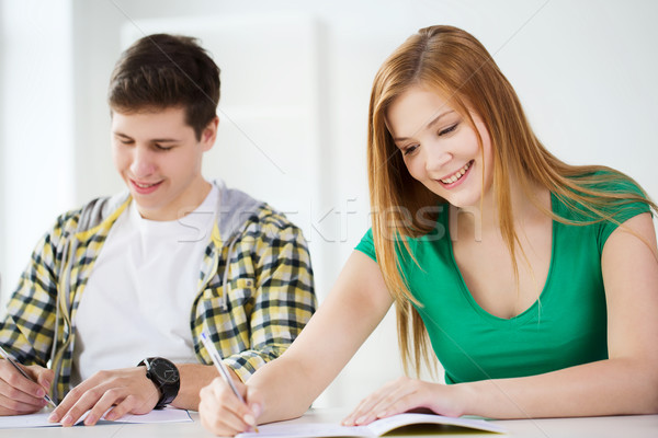 Mosolyog diákok tankönyvek iskola oktatás kettő Stock fotó © dolgachov