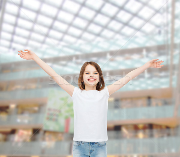 Lächelnd kleines Mädchen weiß tshirt Werbung Kindheit Stock foto © dolgachov