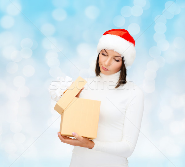 Femme helper chapeau coffret cadeau Noël Photo stock © dolgachov