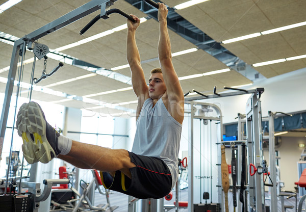 Hombre abdominal músculos bar deporte fitness Foto stock © dolgachov