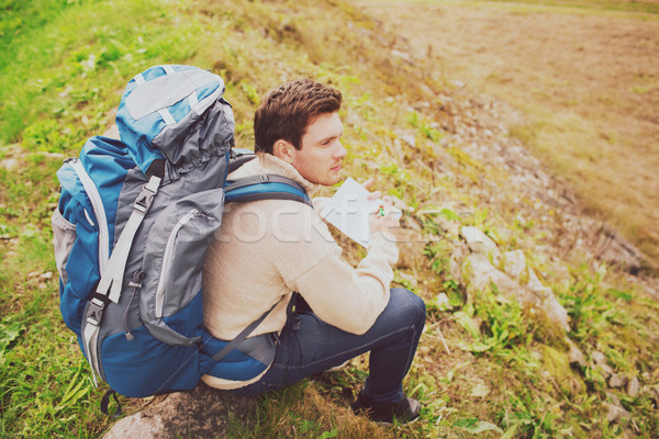 man with backpack hiking Stock photo © dolgachov