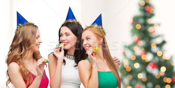 三 微笑 婦女 吹 青睞 商業照片 © dolgachov