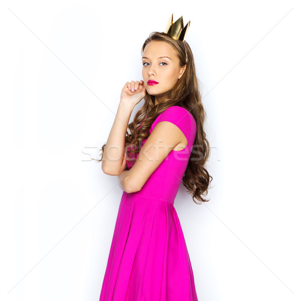young woman or teen girl in pink dress Stock photo © dolgachov