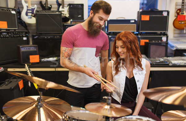 [[stock_photo]]: Homme · femme · tambour · musique · magasin