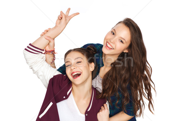 Boldog csinos tinilányok mutat béke kézjel Stock fotó © dolgachov