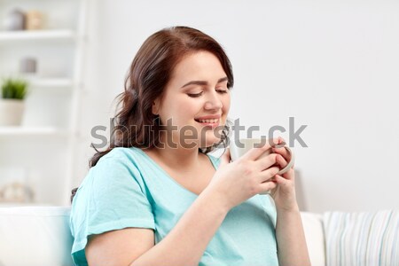 Boldog plus size nő csésze tea otthon Stock fotó © dolgachov