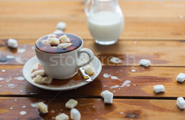 close up of sugar in coffee cup on wooden table Stock photo © dolgachov