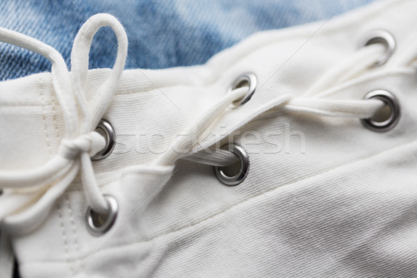 close up of lacing on clothing item Stock photo © dolgachov