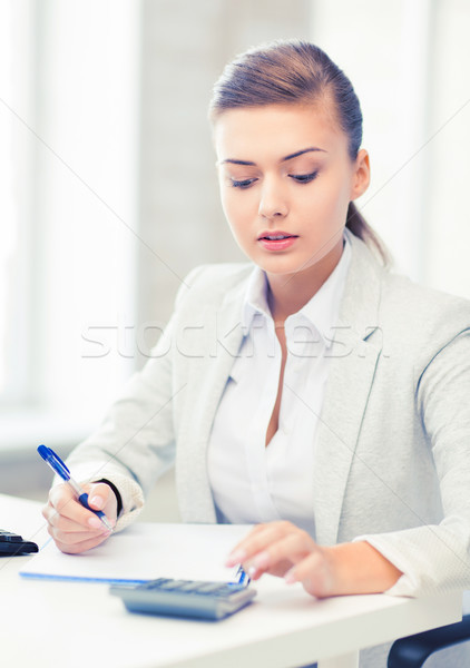 女性実業家 ノートブック 電卓 画像 ビジネス オフィス ストックフォト © dolgachov