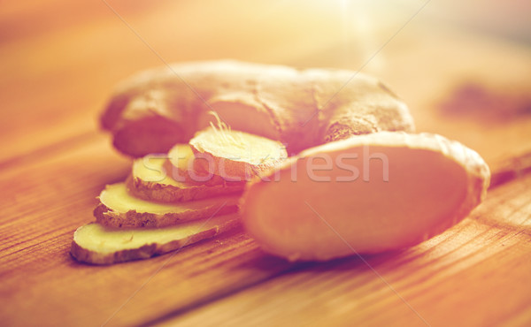 close up of ginger root on wooden table Stock photo © dolgachov