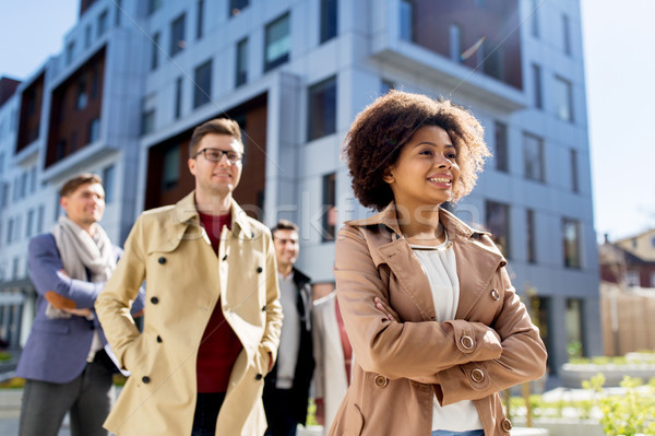 international group of people on city street Stock photo © dolgachov