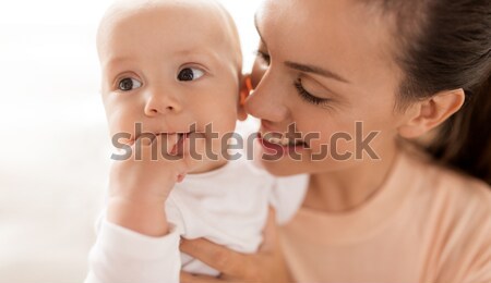 happy mother with little baby boy at home Stock photo © dolgachov