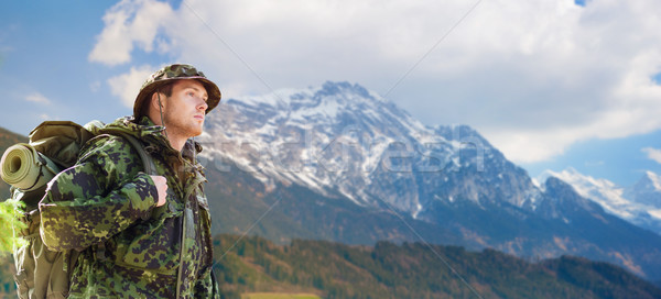 soldier in military uniform with backpack hiking Stock photo © dolgachov
