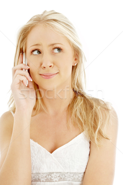 surprised teenage girl with a phone Stock photo © dolgachov
