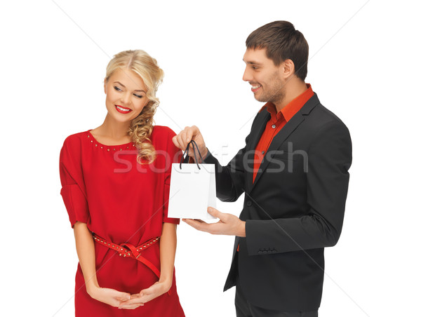 man and woman with present Stock photo © dolgachov