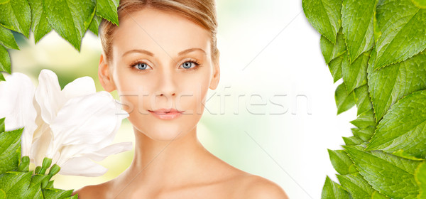 beautiful woman with madonna lily Stock photo © dolgachov