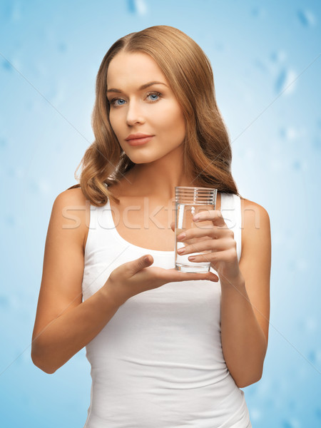 Kadın cam su resim güzel bir kadın vücut Stok fotoğraf © dolgachov