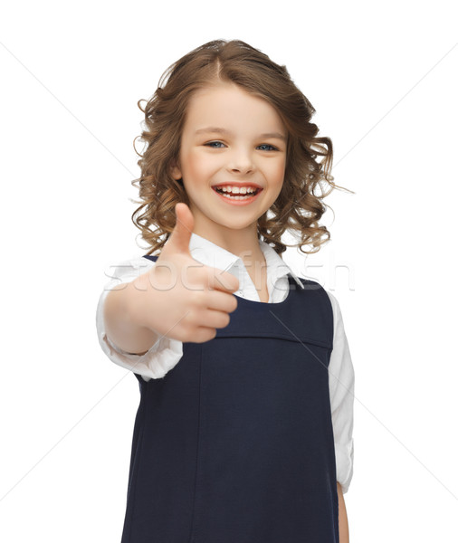 pre-teen girl showing thumbs up Stock photo © dolgachov