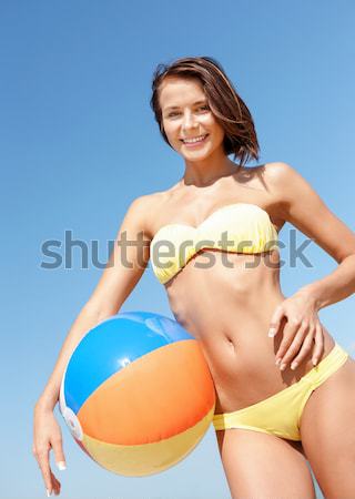 Gyönyörű nő bikini strandlabda fényes kép nő Stock fotó © dolgachov