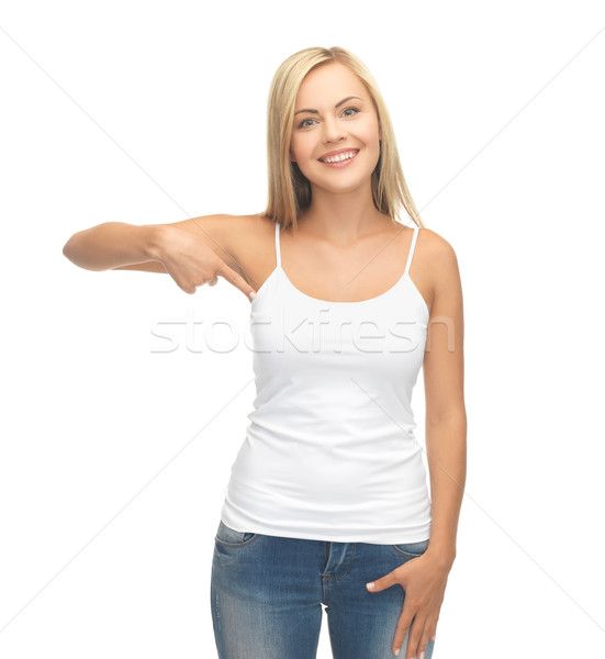 Stockfoto: Vrouw · witte · tshirt · wijzend · gelukkig · glimlach