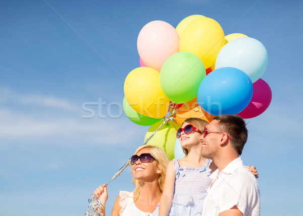Stock foto: Glückliche · Familie · farbenreich · Ballons · Freien · Sommer · Feiertage