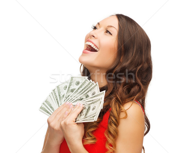 woman in red dress with us dollar money Stock photo © dolgachov