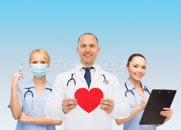 グループ 笑みを浮かべて 医師 赤 心臓の形態 薬 ストックフォト © dolgachov
