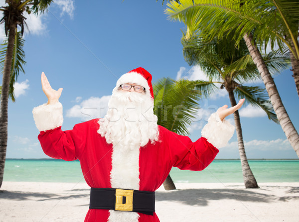 man in costume of santa claus Stock photo © dolgachov