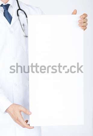 Arzt halten weiß Banner Familie Stock foto © dolgachov