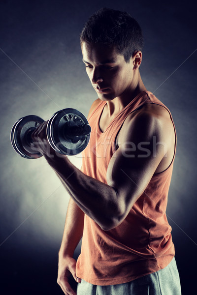 Junger Mann Hantel Sport Bodybuilding Ausbildung Menschen Stock foto © dolgachov