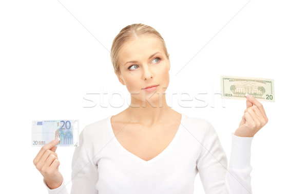 woman with euro and dollar money notes Stock photo © dolgachov