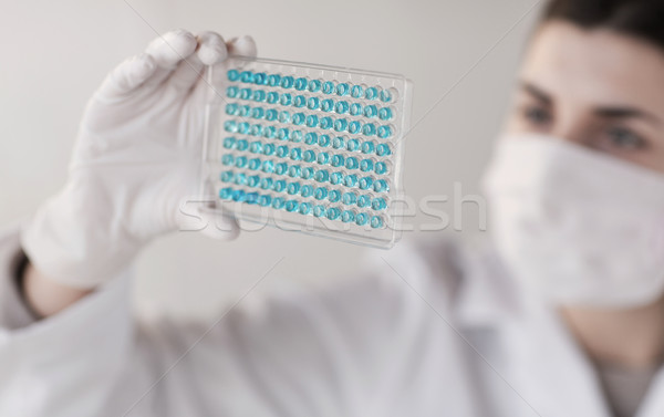 close up of scientist making test in lab Stock photo © dolgachov