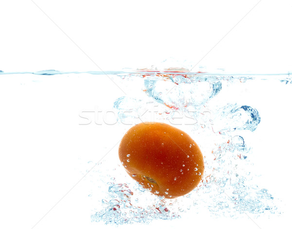 tomato falling or dipping in water with splash Stock photo © dolgachov