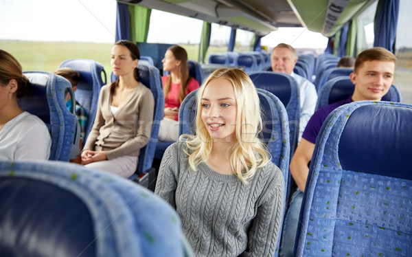 group of passengers or tourists in travel bus Stock photo © dolgachov