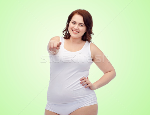 Foto stock: Plus · size · mulher · roupa · interior · indicação · dedo · gesto