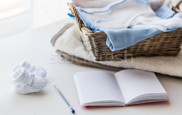 Baby kleding pasgeboren notebook moederschap Stockfoto © dolgachov