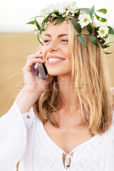 happy young woman calling on smartphone at country Stock photo © dolgachov