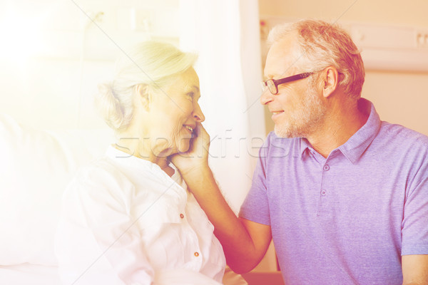 senior couple meeting at hospital ward Stock photo © dolgachov