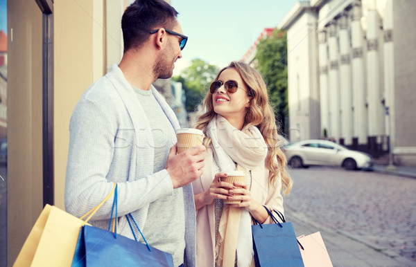 快樂 情侶 購物袋 咖啡 城市 出售 商業照片 © dolgachov