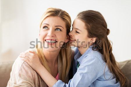 Fille heureuse chuchotement secret mère maison personnes [[stock_photo]] © dolgachov