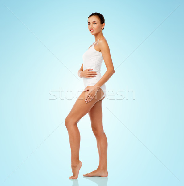 beautiful young woman in white underwear Stock photo © dolgachov