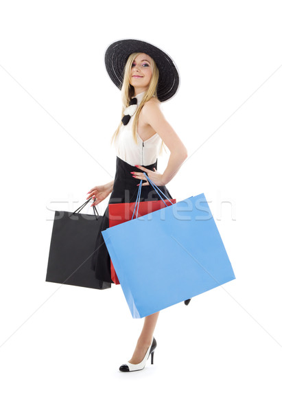 Shopping fille élégante rétro chapeau Photo stock © dolgachov
