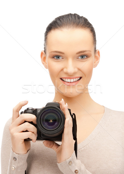 teenage girl with digital camera Stock photo © dolgachov