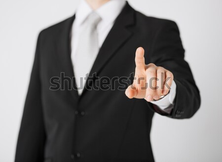 Człowiek środkowy palec biznesmen Zdjęcia stock © dolgachov